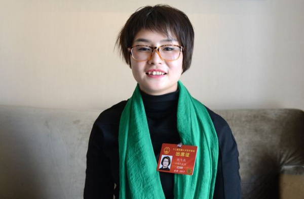 90后女人大代表不断被抹黑 收养弃婴亲子鉴定证清白