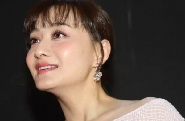 周星驰陈德容往事 她被周星驰吹裙子成万众情人
